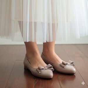 Elegant Rose Gold Leather Bow Flats